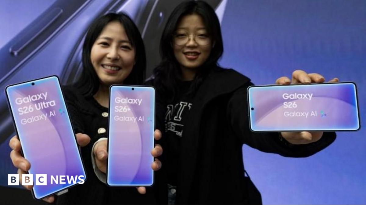 Two women show off Samsung Electronics Co's latest smartphone Galaxy S26 Ultra series at a showcase in Seoul, South Korea