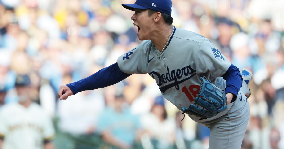 Milwaukee, WI - October 12, 2026: Yoshinobu Yamamoto #18 of the Los Angeles Dodgers pitches in the first inning against the